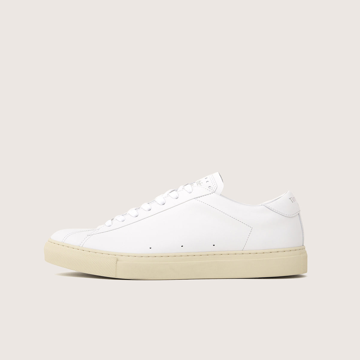 clean white sneaker atlantique by fench brand timothee paris profile photo